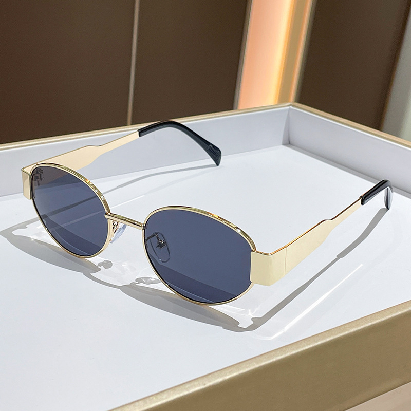 Trendy ronde metalen zonnebril - Street Fashion Glasses recensie en prijs
